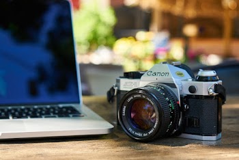 Black and Silver Canon Dslr Camera