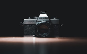 Black and Silver Minolta Camera
