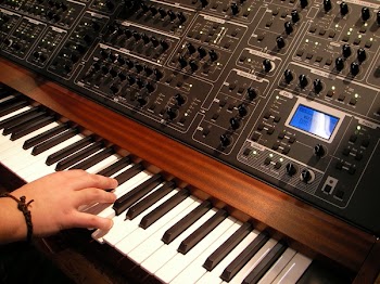 Black and White Audio Mixer on Top of Piano