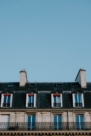 Black and White Concrete Building Under Blue Sky · Free Stock Photo