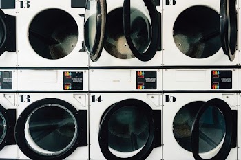 black and white front-load clothes washer lot