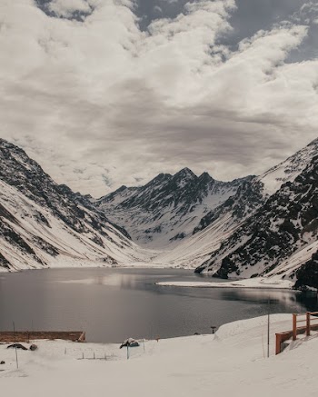 Black and White Mountains Under White Sky