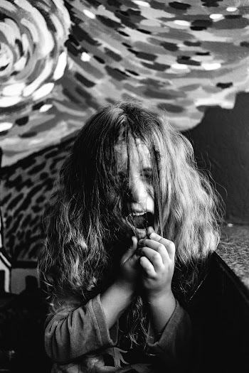 Black and White Picture of a Crying Child