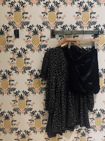 Black and White Polka-dot Long-sleeved Dress Hung on Wall Hook