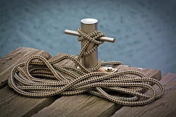 Black and White Rope Tied on Stainless Steel Tube