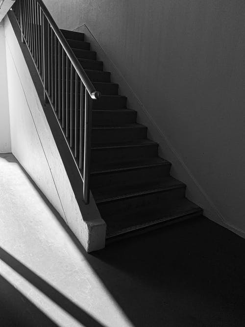 Black and White Staircase With White Concrete Staircase · Free Stock Photo
