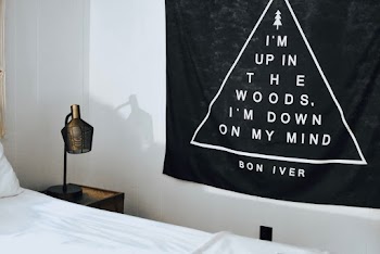 Black and White Text-printed on Towel Hanging on Wall