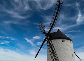 Black and White Windmill Tower and Clear Blue Sky