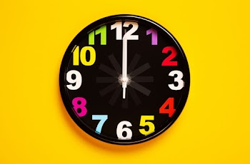 Black and Yellow Analog Clock
