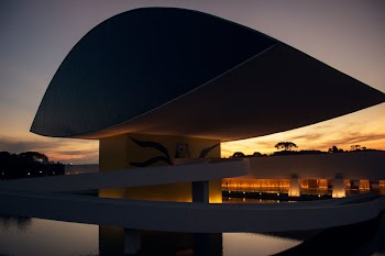 Black and Yellow Building during Orange Sunset