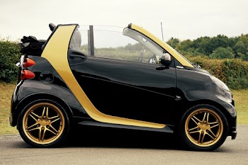 Black and Yellow Smart Car on Focus Photography