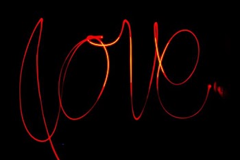 black background with love text overlay