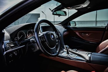 black BMW steering wheel with airbag cover
