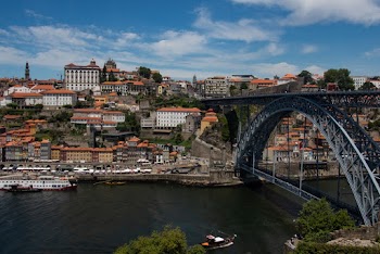 Black Bridge Near Body of Water