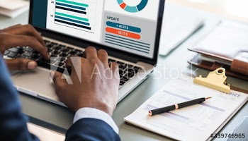 Black businessman using computer laptop