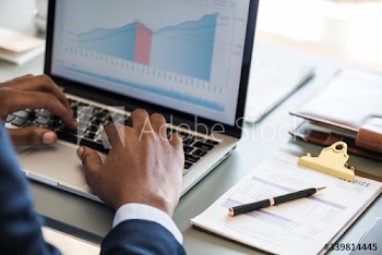 Black businessman using computer laptop