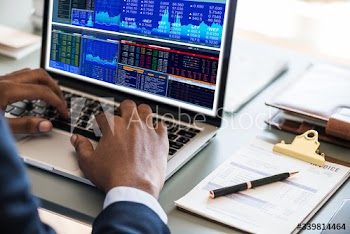 Black businessman using computer laptop