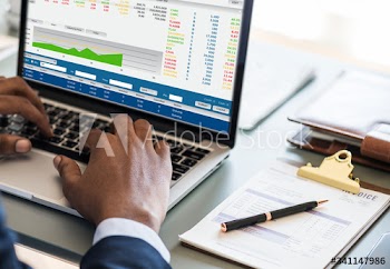 Black businessman using computer laptop