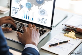 Black businessman using computer laptop