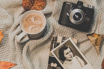 Black Camera Beside Mug