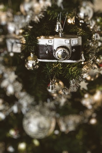 Black Camera Hanged on Christmas Tree