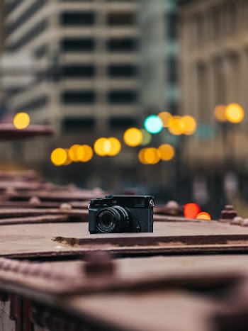 Black Camera On Surface