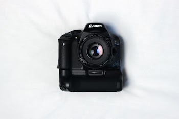 black Canon DSLR camera