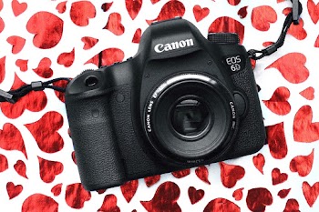 Black Canon Eos 6d Camera on Red and White Surface