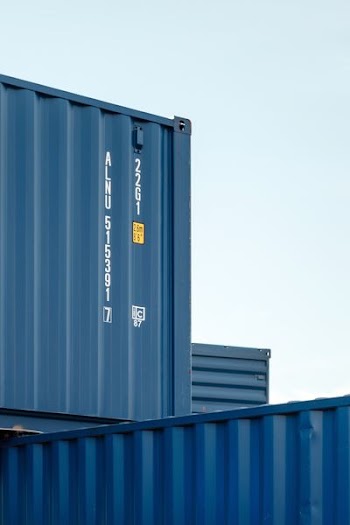 black cargo tanks piled up