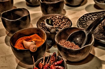 Black Ceramic Bowl With Different Kinds of Condiments