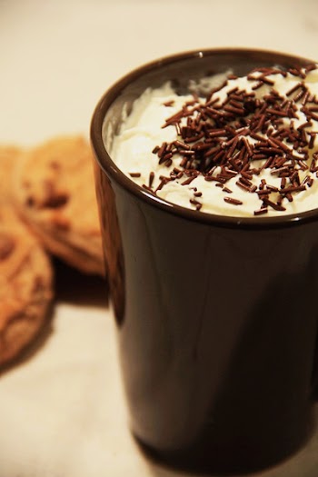 Black Ceramic Mug Filled With Dessert