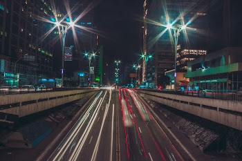 Black Concrete Road Beside Buildings