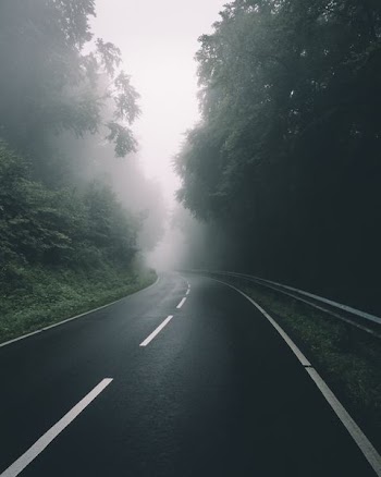 black concrete road during daytime