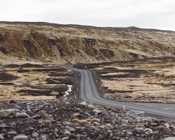 Black Concrete Road Near Mountain