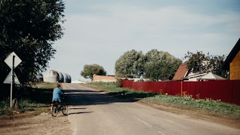 Black Concrete Road Under Blue Sky