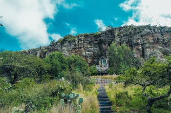 Black Concrete Staircase and Massive Mountain