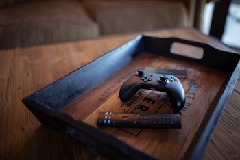 Black Controller On Tray