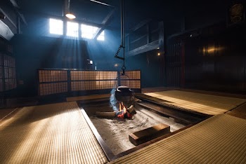 Black Cooking Pot in the Middle of a Room