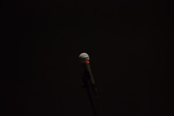 black corded microphone with stand