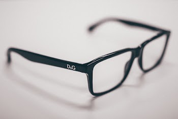 Black Dolce &amp; Gabanna Eyeglasses on White Surface