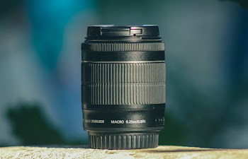Black Dslr Camera Lens in Shallow Focus Photography