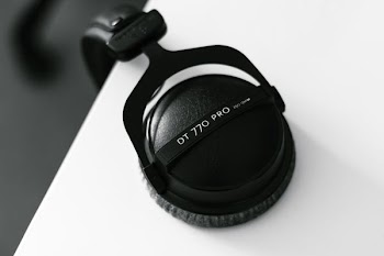 black DT 770 Pro headphones on white surface