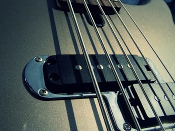 Black Electric Guitar in Closeup Photography