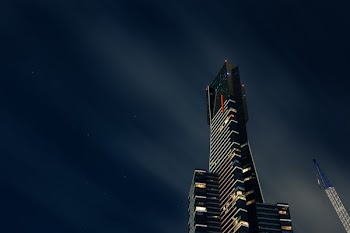 black high-rise building during daytime