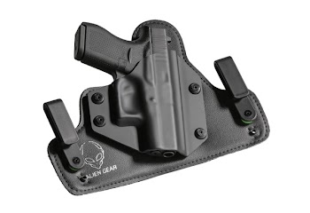 Black Holster With Handgun