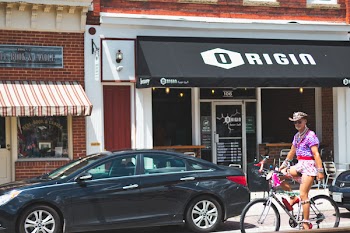 Black Hyundai Sonata Sedan Parked Beside Building