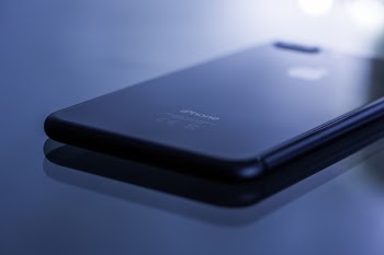 Black Iphone 7 Plus on White Surface