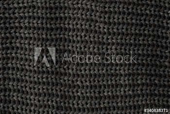 Black knitted fabric background