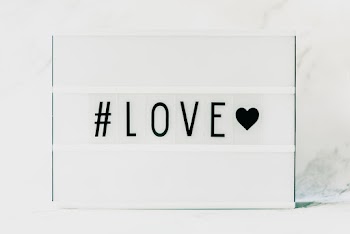 Black #love and Black Heart on White Background