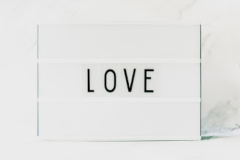 Black Love Text on White Background